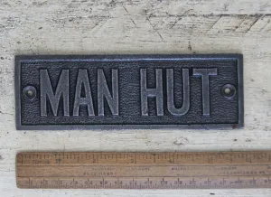 Cast iron plaque Man Hut